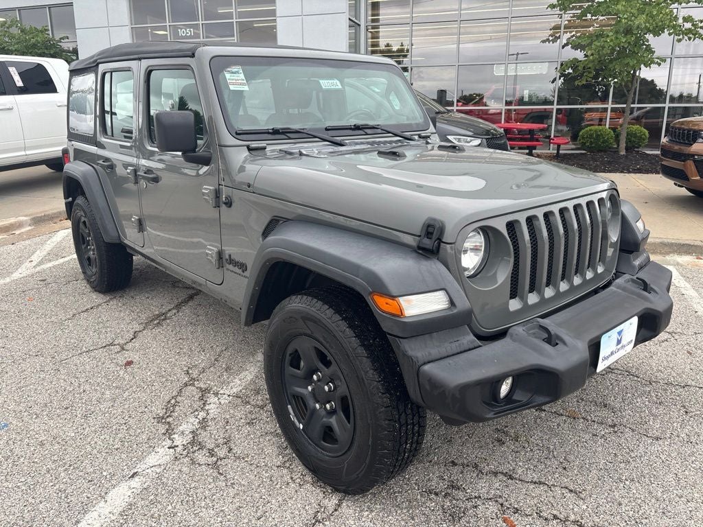 Used 2023 Jeep Wrangler 4-Door Sport with VIN 1C4HJXDG5PW697818 for sale in Kansas City